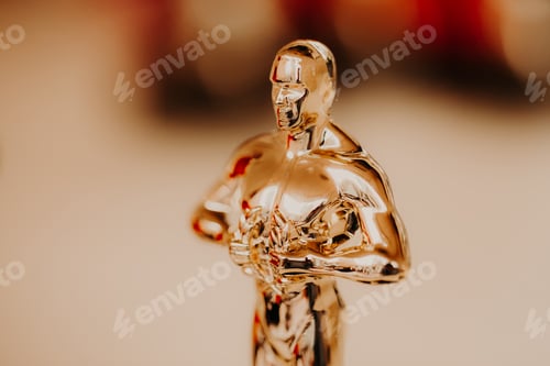 Preview: Nomination and Oscar reward concept. Golden statue for victory and success