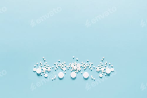 Preview: Scattered white pills on blue background. Mock up for special offers as advertising, web background