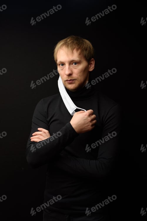 Preview: Middle aged man with medical face mask portrait close up
