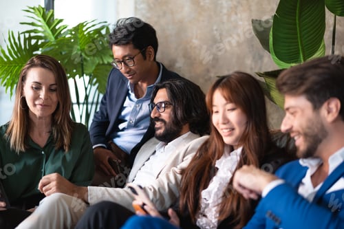 Preview: Business team work break talking together in a corporate relaxation area