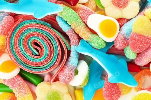 Preview: Gummy candies all over background, close up