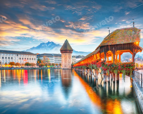 Preview: Breathtaking historic city center of Lucerne with famous buildings and old wooden Chapel Bridge