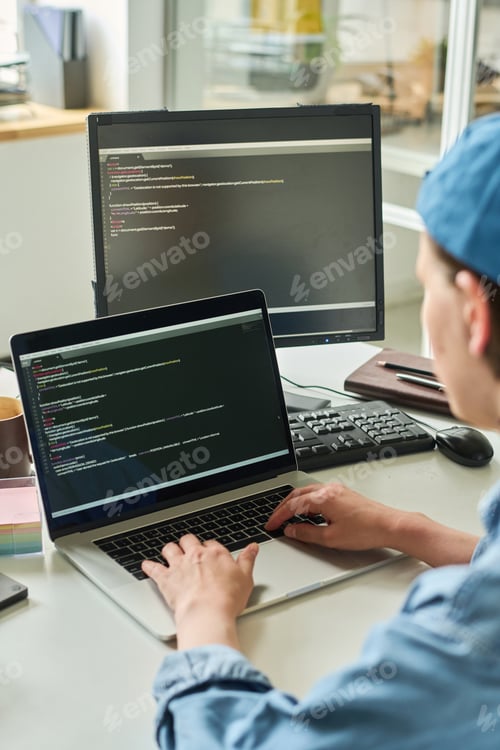 Preview: Programmer creating apps on laptop