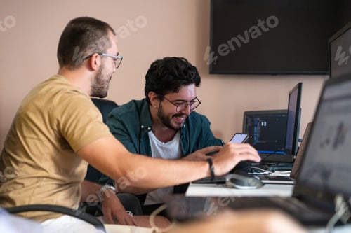 Preview: Collaborative Minds: A Team of Programmers Tackling Challenges Together in the Office.