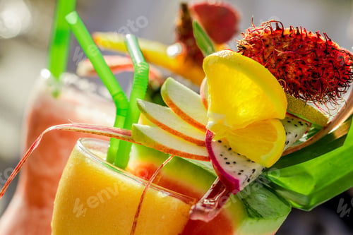 Preview: Closeup of drink with watermelon and fresh fruits