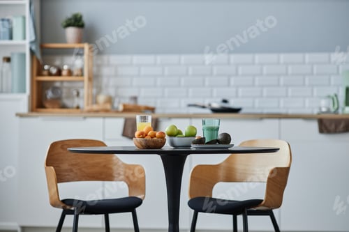 Preview: Minimal kitchen interior with elegant wooden chairs and table
