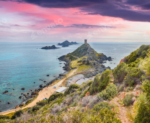 Preview: Sunset over popular tourist destination Torra di a Parata with Genoese Tower