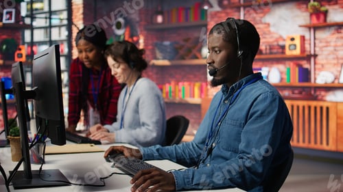 Preview: Account management team coworkers in office bonding with clients