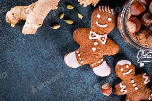 Preview: Christmas frame with gingerbread cookies. Christmas cookies, nuts and spices. Copy space for text.