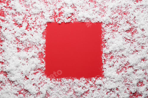 Preview: Frame made of snow on red background, top view with space for text. Winter season
