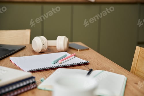 Preview: Young woman enjoying a productive day at home surrounded by personal interests and creativity