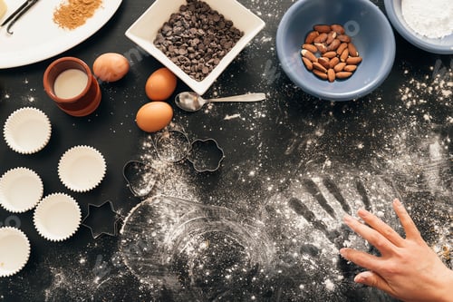 Preview: Beautiful woman Preparing Cookies And Muffins.