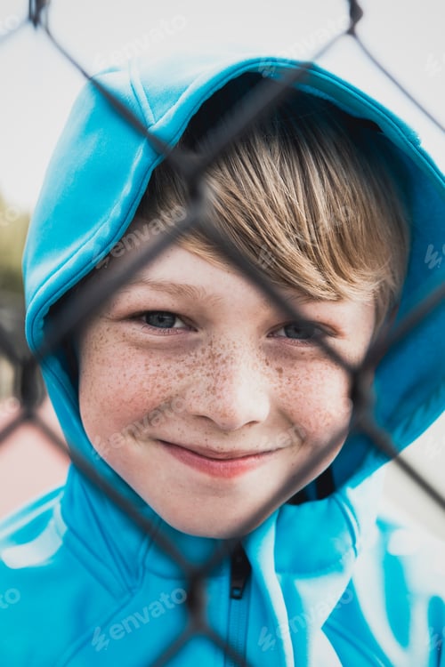 Preview: Boy Behind Fence