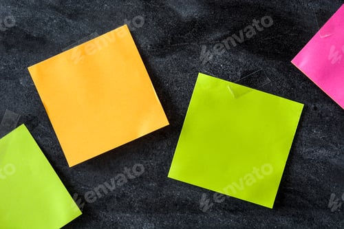 Preview: Colorful sticky notes taped to dark stone surface