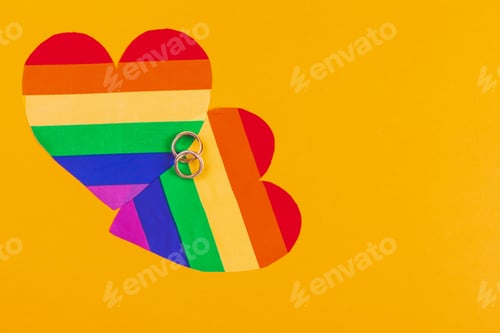 Preview: Gay Marriage Concept with Rainbow flag and rings