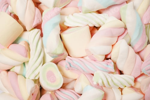 Preview: Multi-colored marshmallows. Background or texture of colorful blue and pink marshmallows