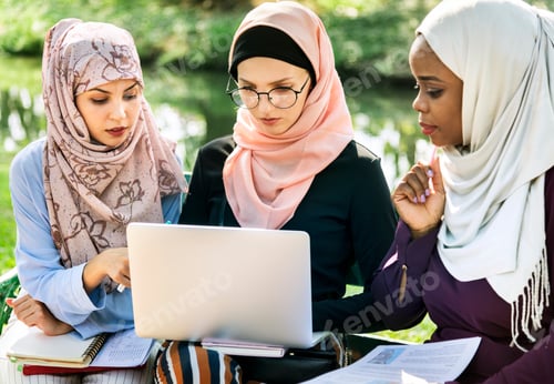 Preview: Group of islamic friends discussing and working together