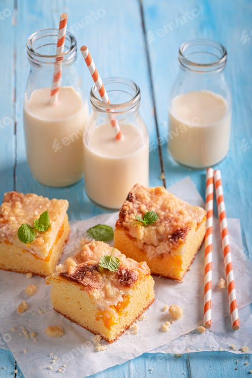 Preview: Homemade peach cake with glaze. Served with milk.