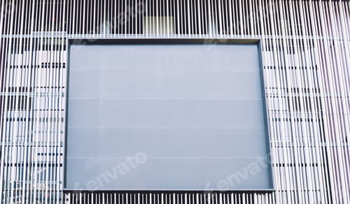 Preview: Contemporary building with empty billboard on facade