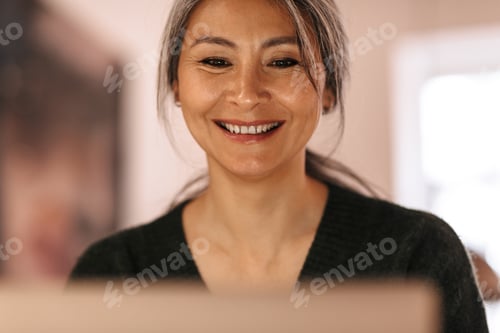 Preview: Amazing positive optimistic woman using laptop computer