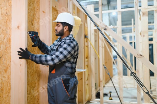 Preview: Indian carpenter works on the construction of modular houses