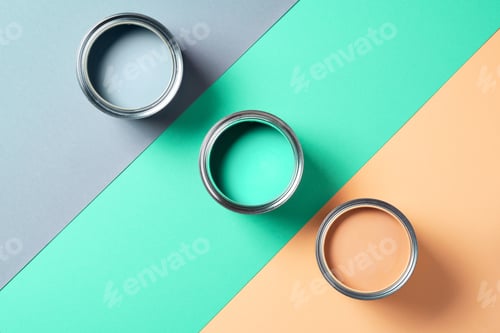Preview: Open cans of paint on bright multicolored background. Top view. Copy space. Trendy green color