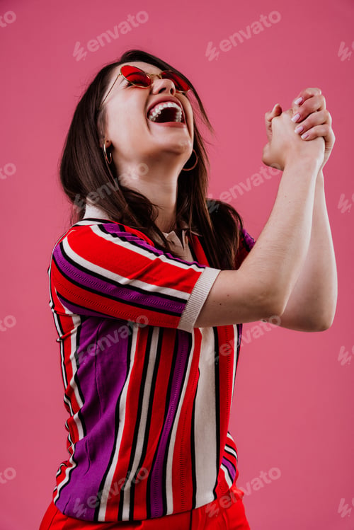 Preview: Young woman showing excitement and happiness