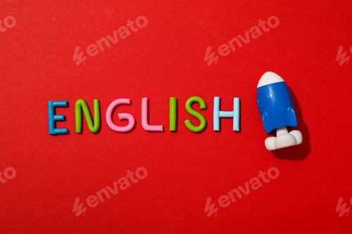 Preview: The word English with a rocket next to it, on a red background.
