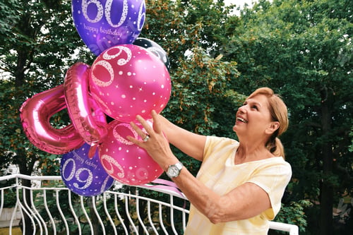 Preview: Mature woman celebrating her 60th birthday