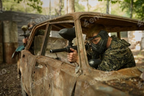 Preview: Warriors shooting with paintball guns, team game