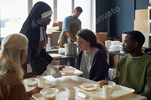 Preview: Serving Lunch to Diverse Group of People in Cafeteria