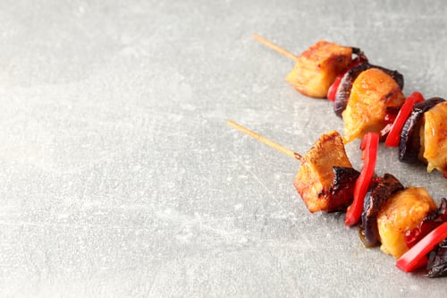 Preview: Tasty chicken shashlik on gray textured background