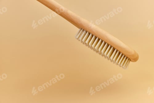 Preview: wooden massage brush with natural bristles on beige background