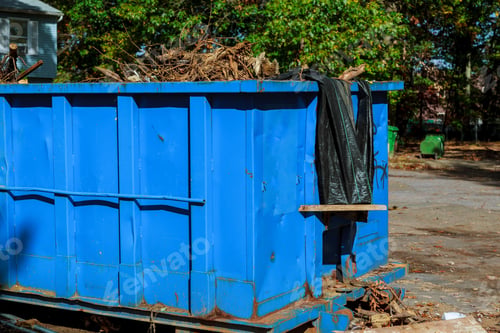 Preview: Dumpsters being full with garbage in a city. Dumpsters being full with garbage
