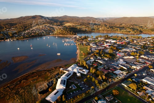 Preview: Aerial view of Saint Helens, serene river, and hills. Tasmania, Australia