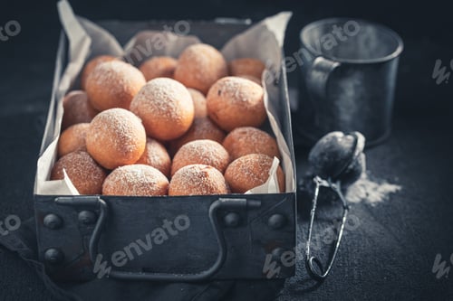 Preview: Sweet and delicious donut balls with powdered sugar