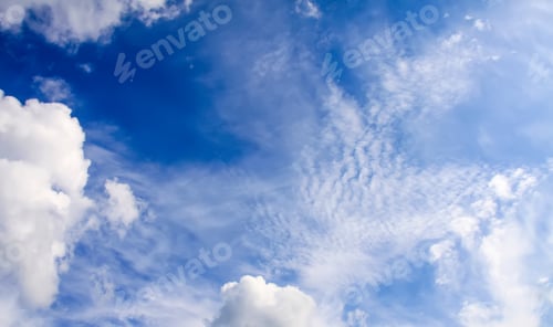 Preview: Sky with white clouds. Cloudy weather in summer day.