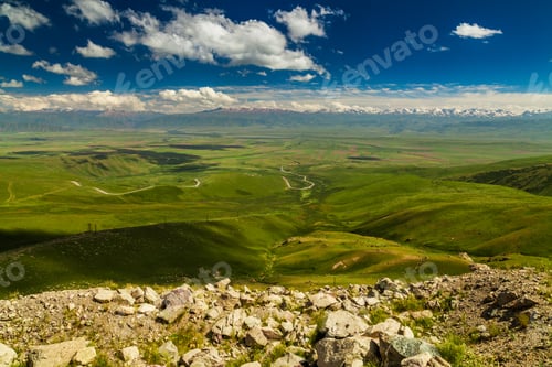 Preview: View from pass to green valley and the mountains