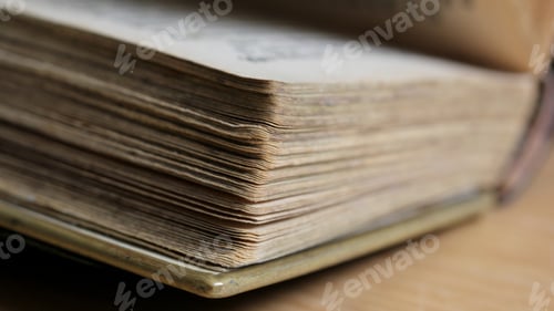 Preview: Closeup shot of pages on an old open book