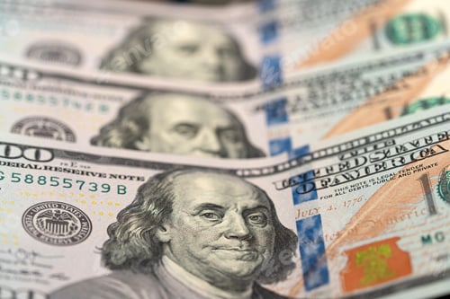 Preview: Top view of 100 dollar bills with the face of Benjamin Franklin