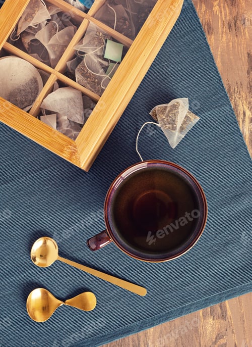 Preview: Traditional tea ceremony setup, teapot and teacup with Herbal tea bags