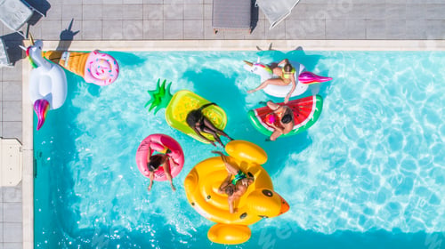 Preview: Friends having fun in a swimming pool