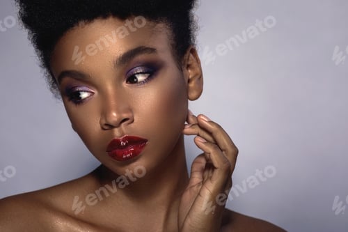 Preview: Young African model with a beautiful makeup