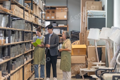 Preview: Asian Male Investor Touring Family-Run Ceramic Warehouse for Partnership Deal