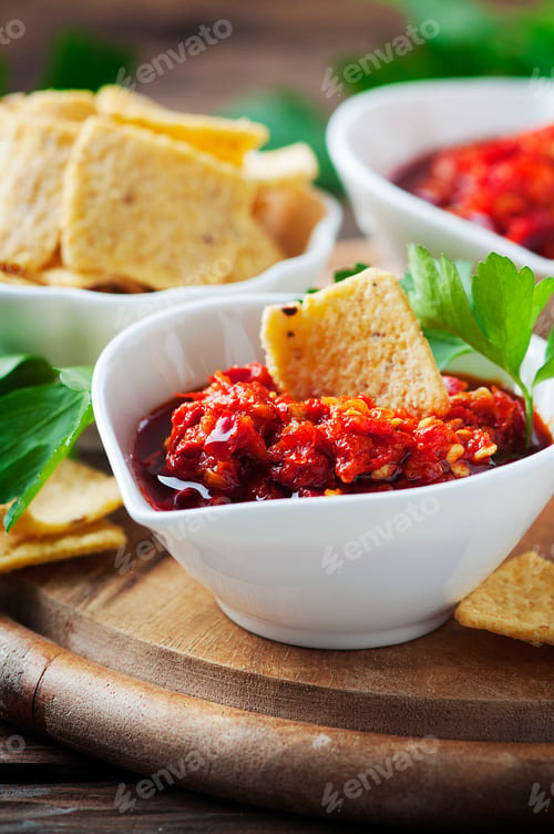Preview: Hot mexican salsa with chili peppers and chips