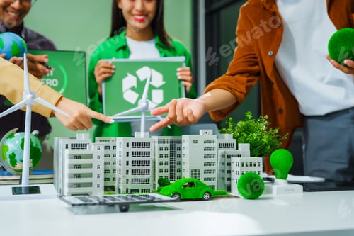 Preview: Colleagues meet at desk brainstorm environmental management strategies. discuss carbon emissions