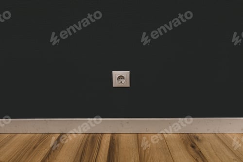Preview: Single power socket in dark wall over wooden floor