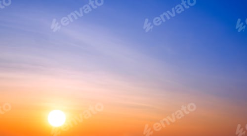 Preview: Sunrise sky in the morning with idyllic beautiful yellow sunlight and cloud on blue sky background
