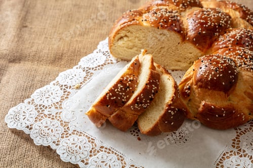 Preview: Easter sweet bread, greek tsoureki, brioche braid slice on table, close up view