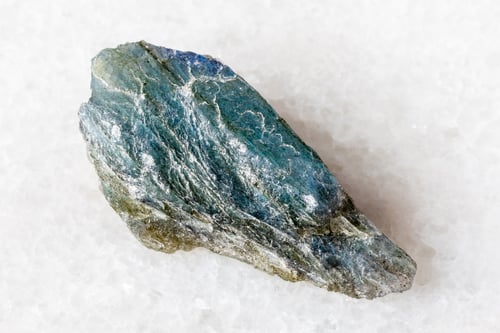 Preview: sample of rough green labradorite rock on white